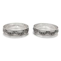 A Pair of Greek Silver Bottle Coasters