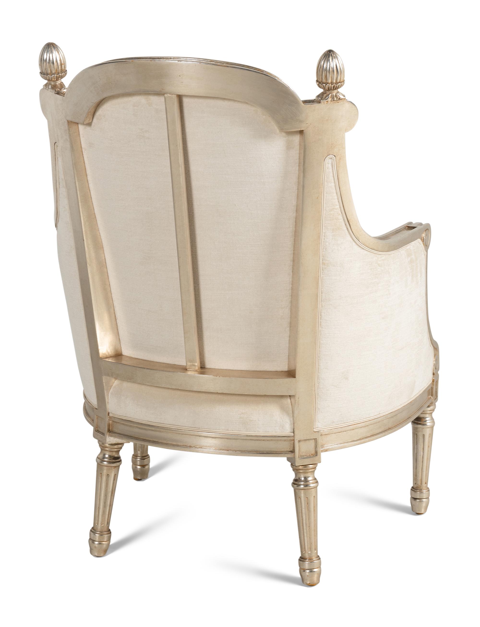 A Pair of Nancy Corzine Silvered Acorn Lounge Chairs and Ottomans