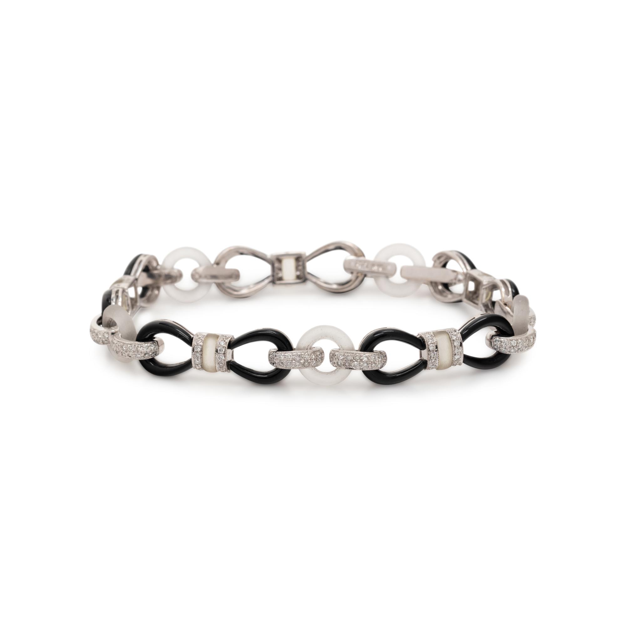 DIAMOND, ONYX AND ROCK CRYSTAL BRACELET