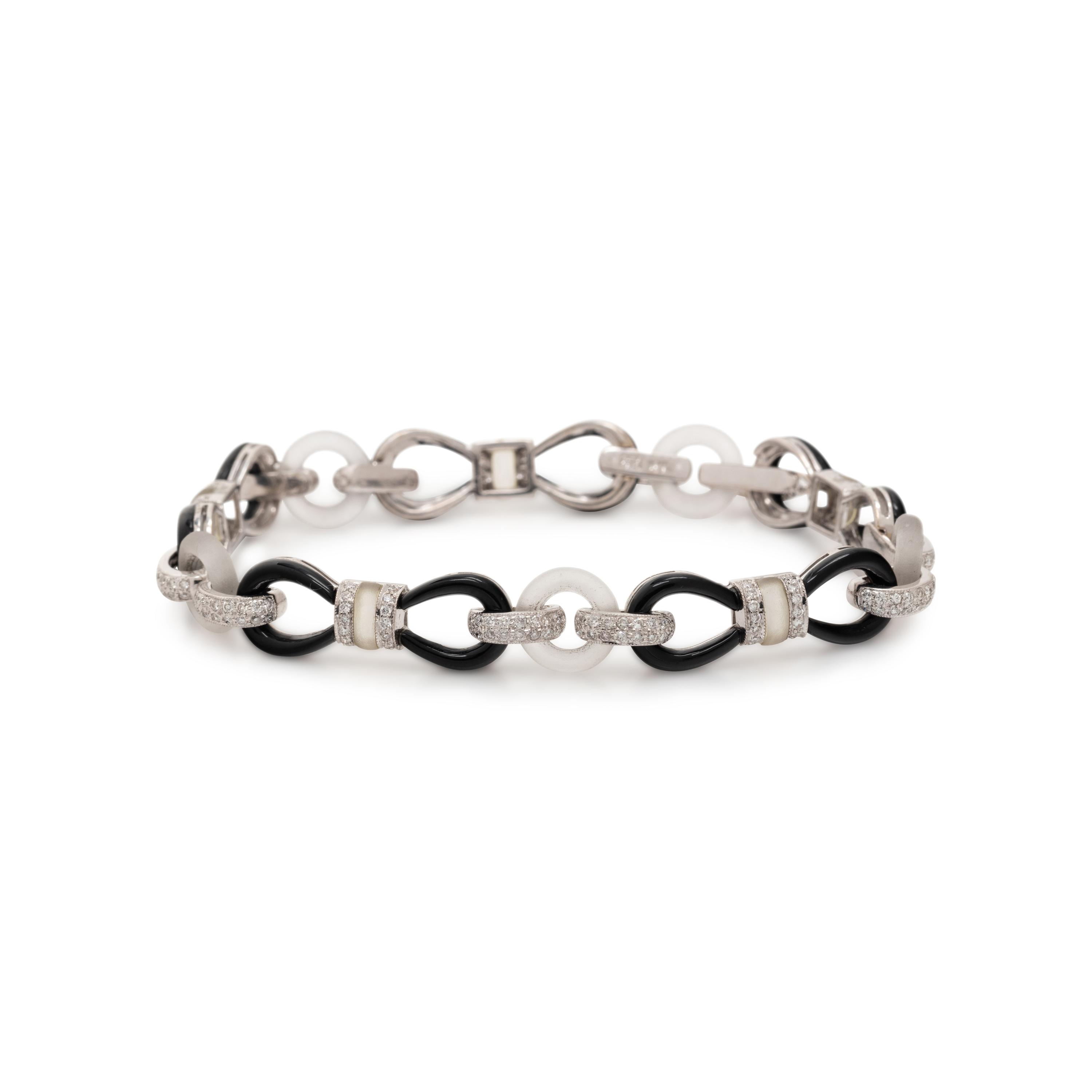 DIAMOND, ONYX AND ROCK CRYSTAL BRACELET