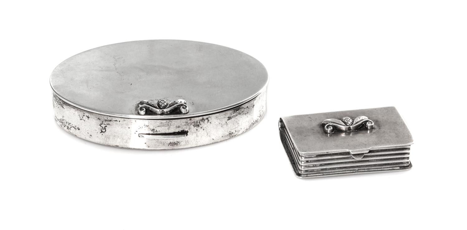 Two American Silver Boxes, Georg Jensen, New York, NY, Mid 20th Century, the larger of oval form, the smaller in the form of a book.