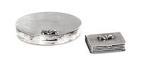 Two American Silver Boxes, Georg Jensen, New York, NY, Mid 20th Century, the larger of oval form, the smaller in the form of a book.