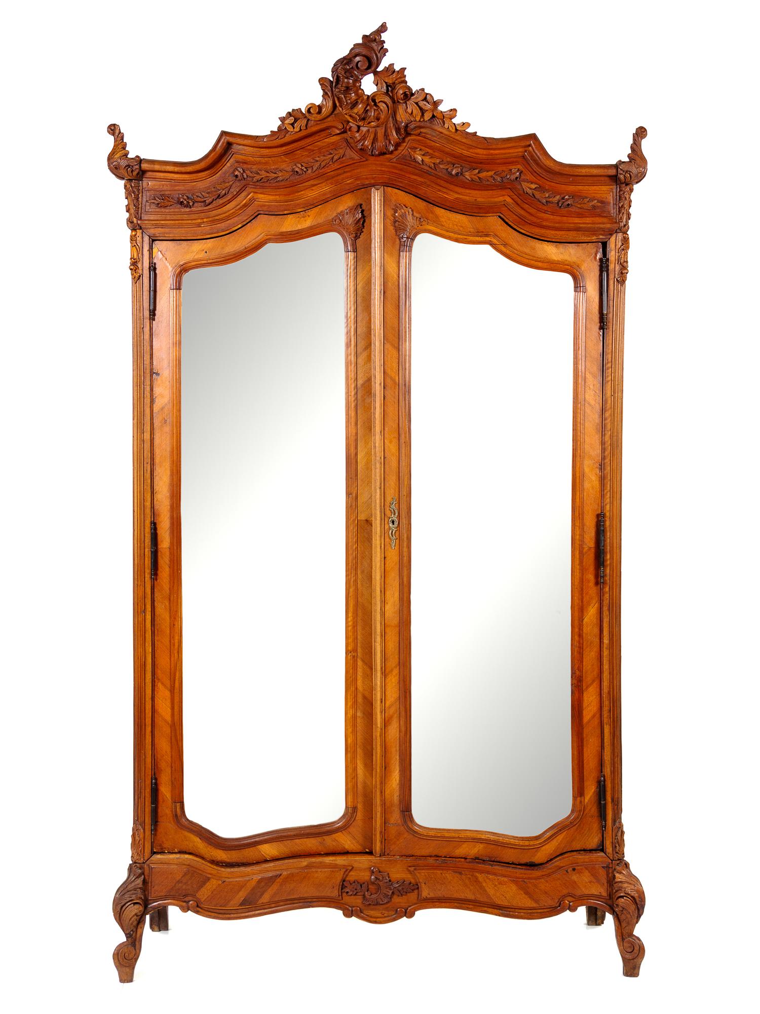 A Louis XV Style Walnut Armoire