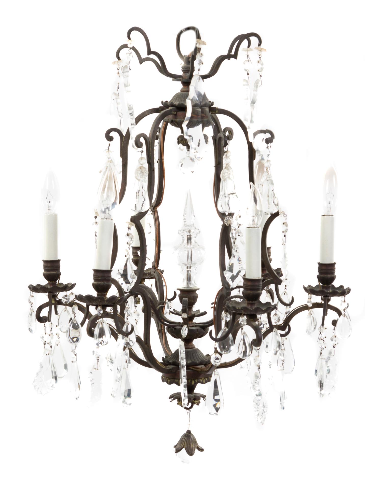A French Wrought Iron Six-Light Chandelier, Height 27 x diameter 19 1/2 inches.