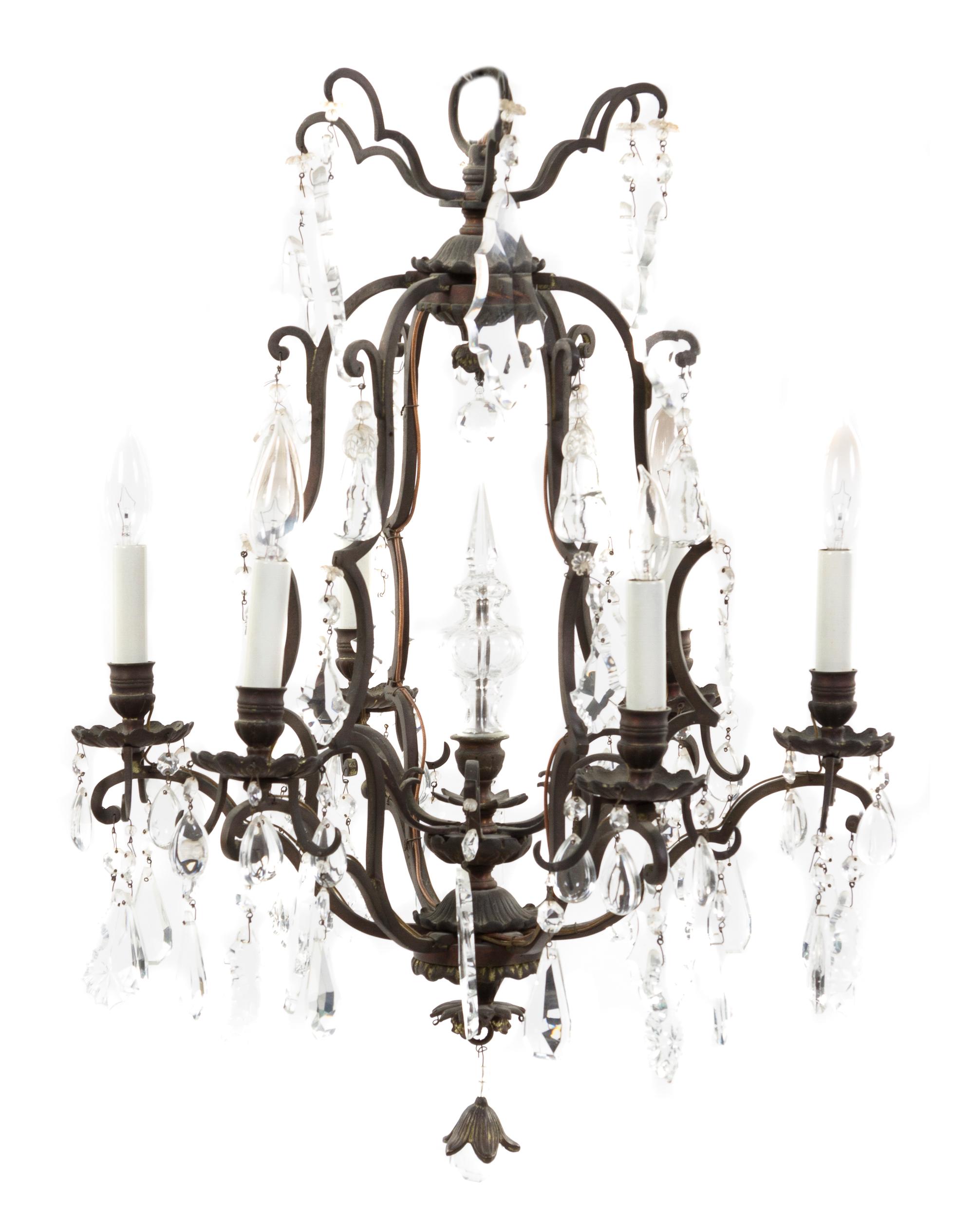 A French Wrought Iron Six-Light Chandelier, Height 27 x diameter 19 1/2 inches.