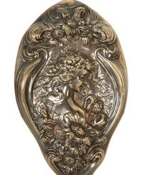 A Silver Hand Mirror and Hairbrush