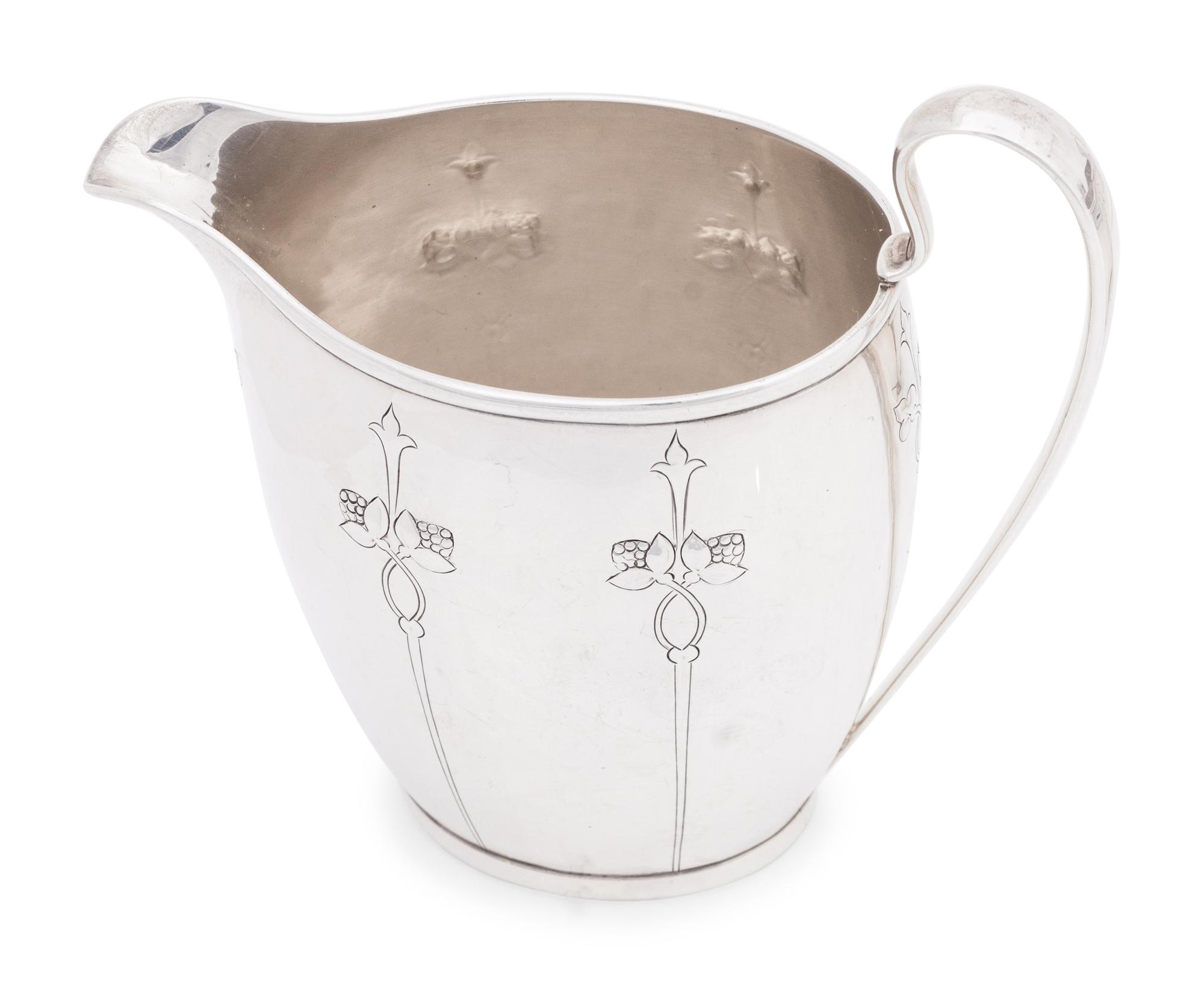 An Arthur Stone Arts and Crafts Silver Creamer and Sugar Set