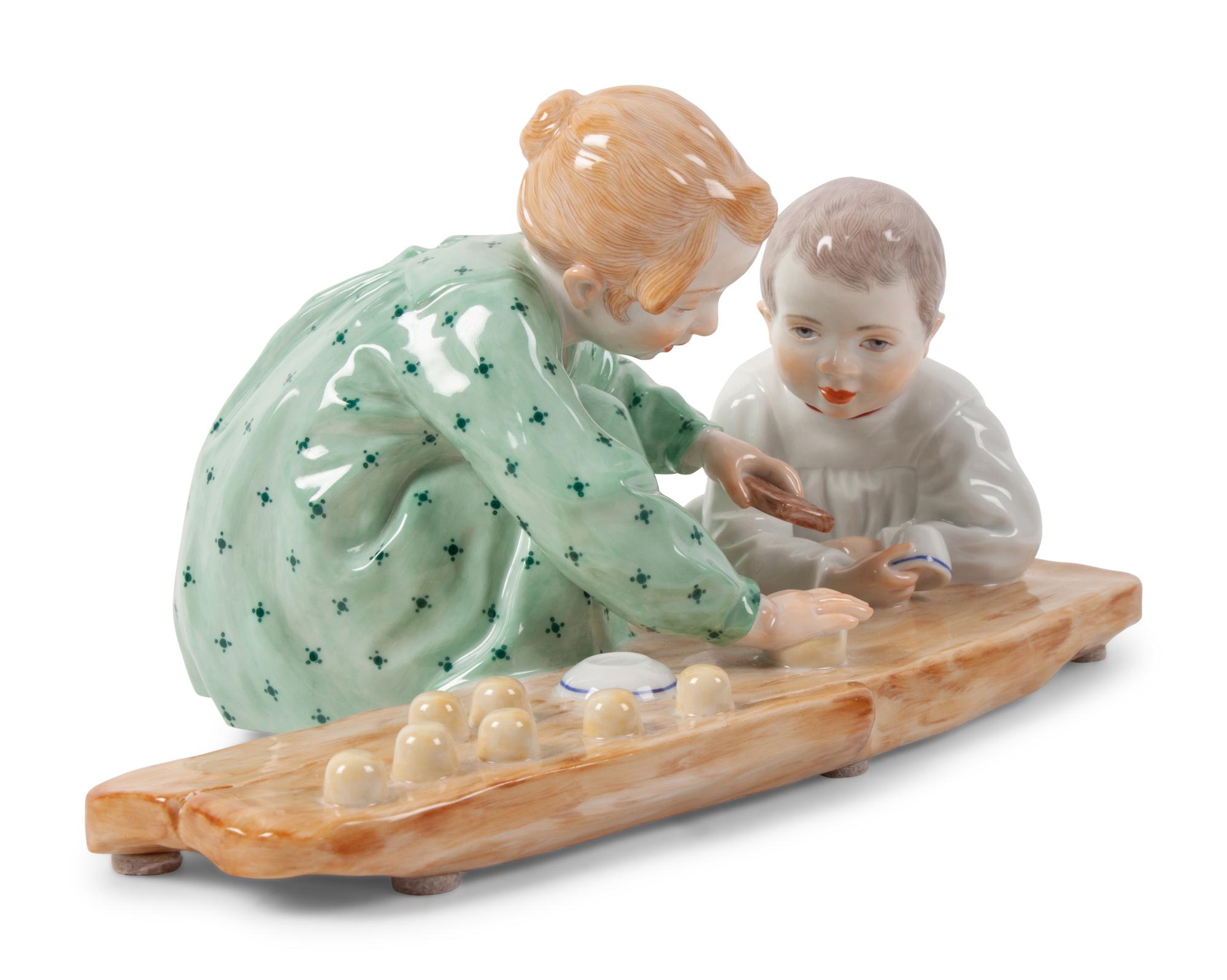 A Meissen Porcelain Figural Group of Children Playing in Sand