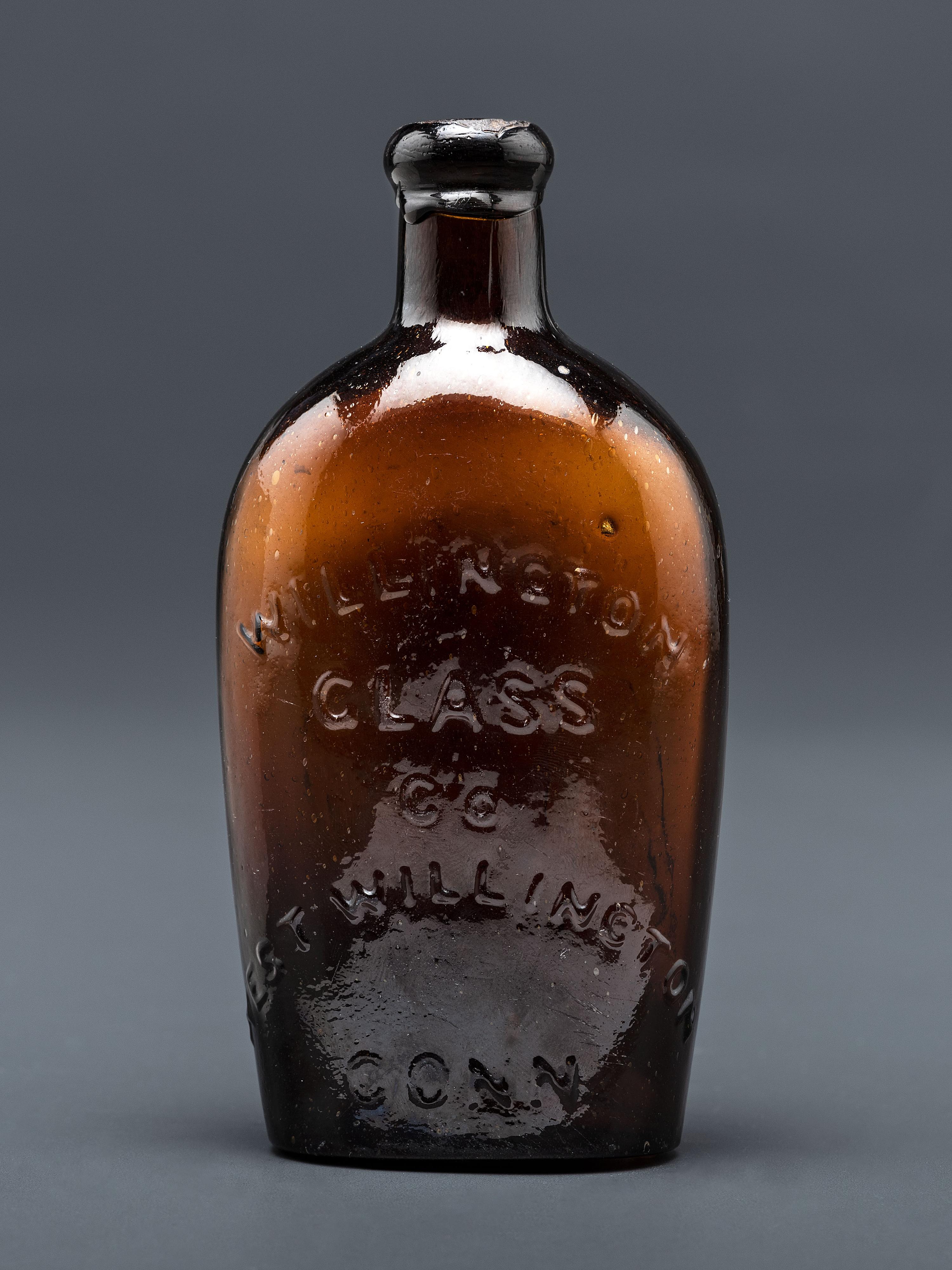 A Molded-Glass Flask in Amber by Willington Glass Company, Connecticut