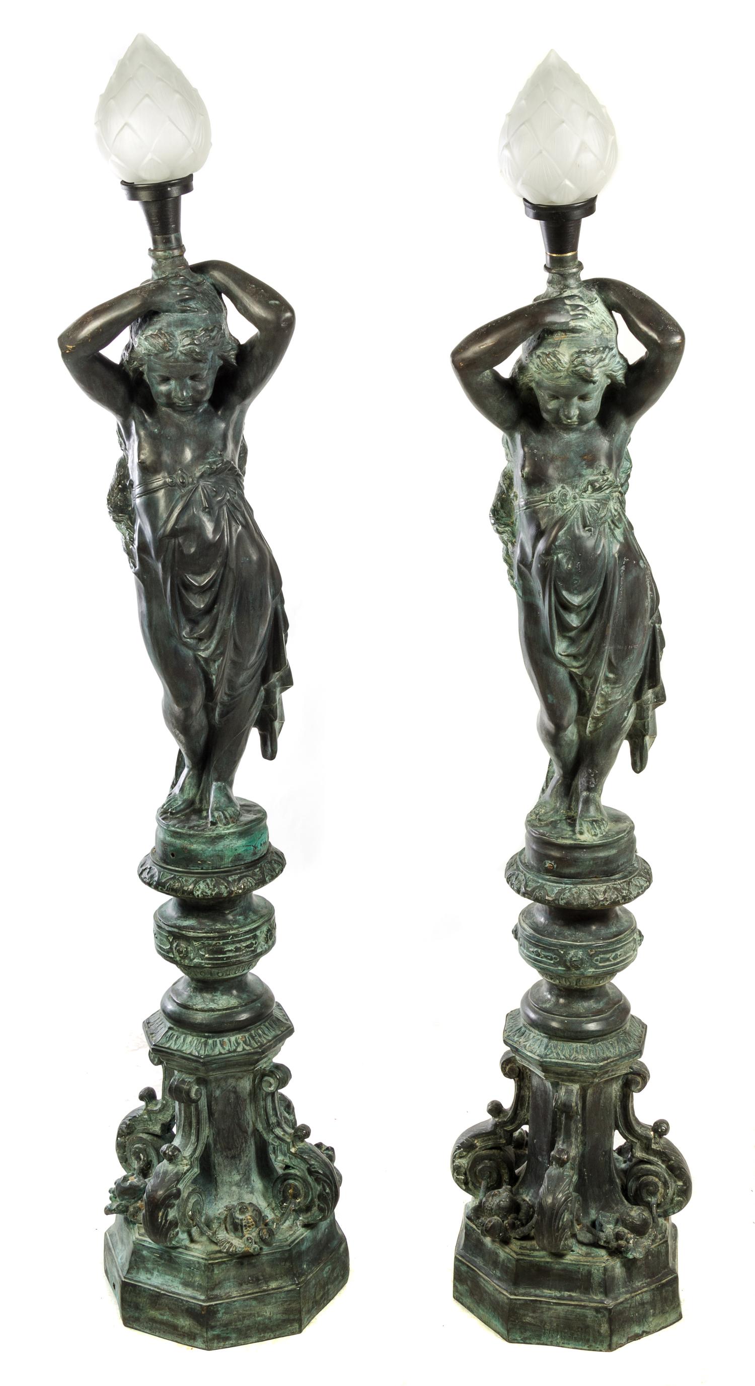 A Pair of Bronze Figural Torcheres Height 88 inches. — 20TH CENTURY