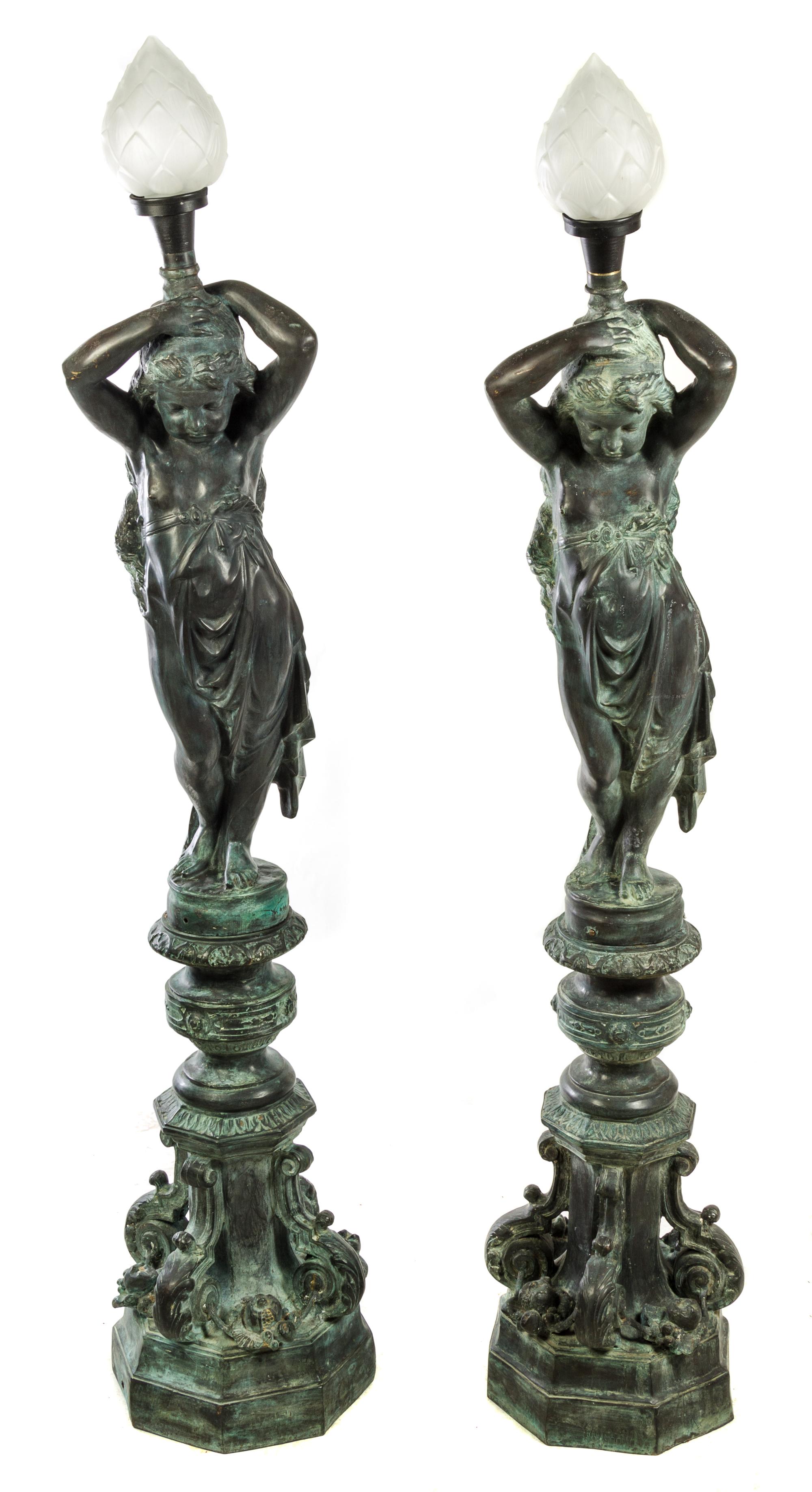 A Pair of Bronze Figural Torcheres Height 88 inches. — 20TH CENTURY