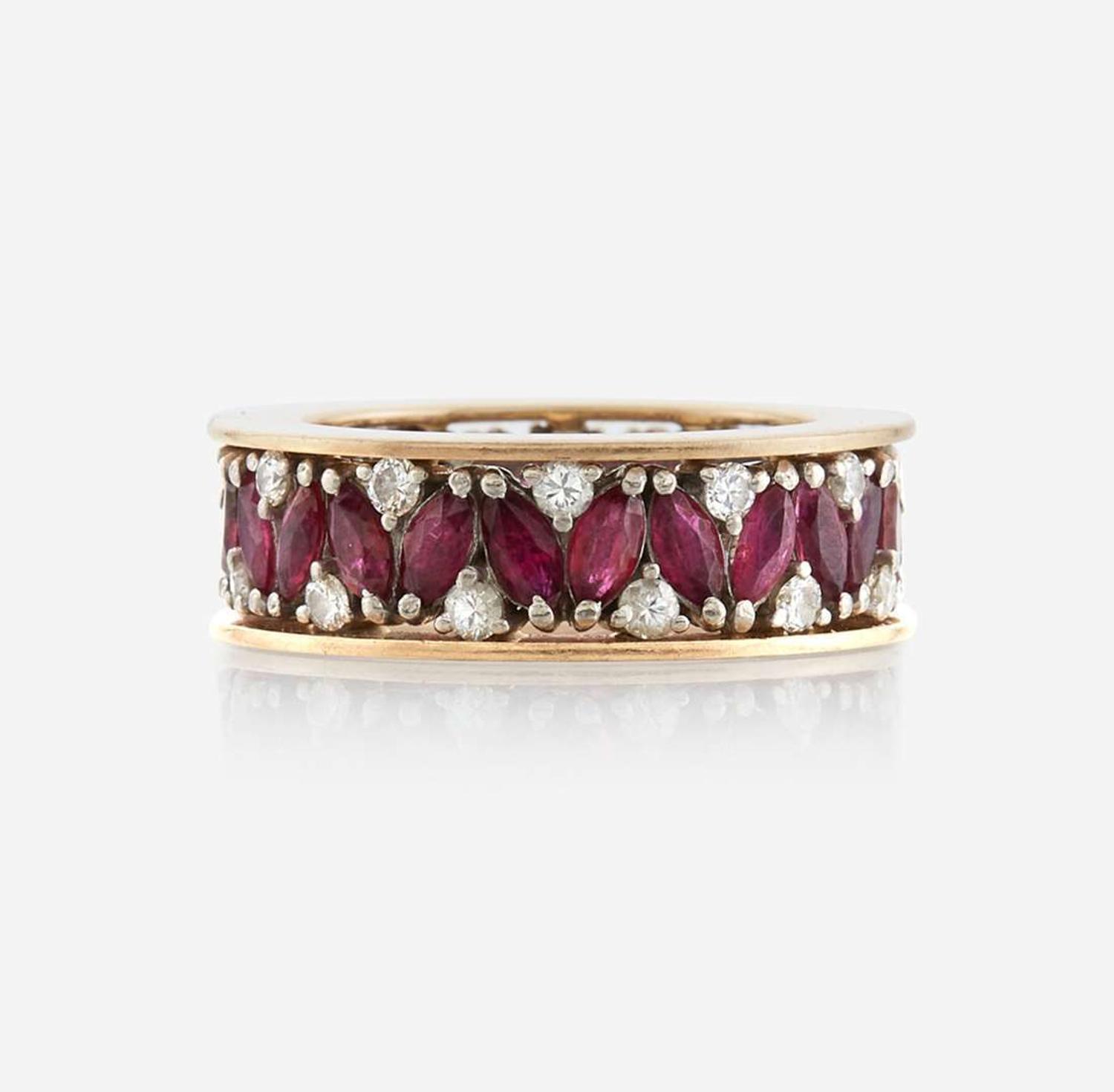 A ruby, diamond, and gold eternity band
