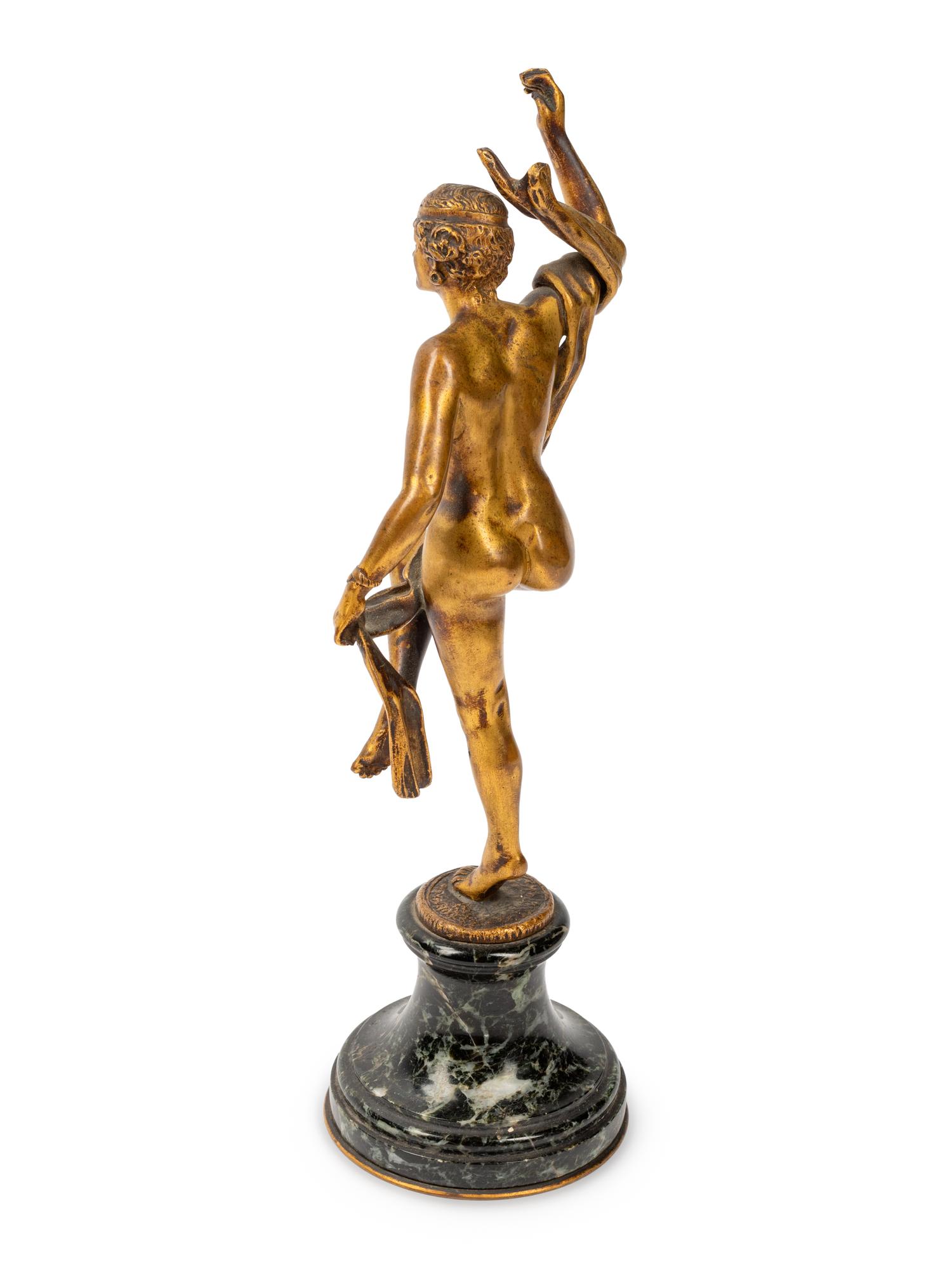 A French Gilt Bronze Figure on a Marble Base