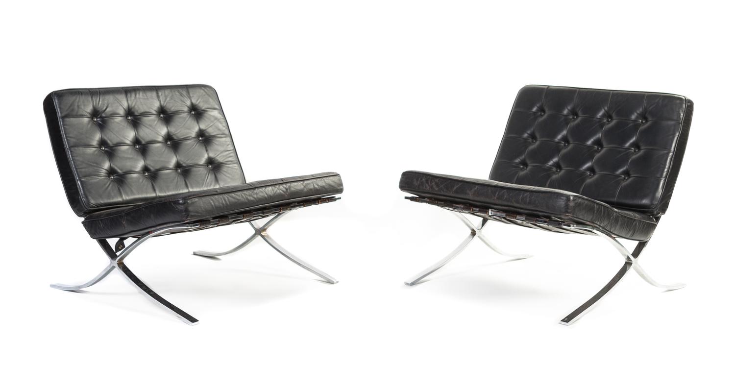 A Pair of Chrome and Leather Barcelona Chairs, after the design by Ludwig Mies Van der Rohe Height 28 1/2 x width 32 1/2 x depth 37 inc