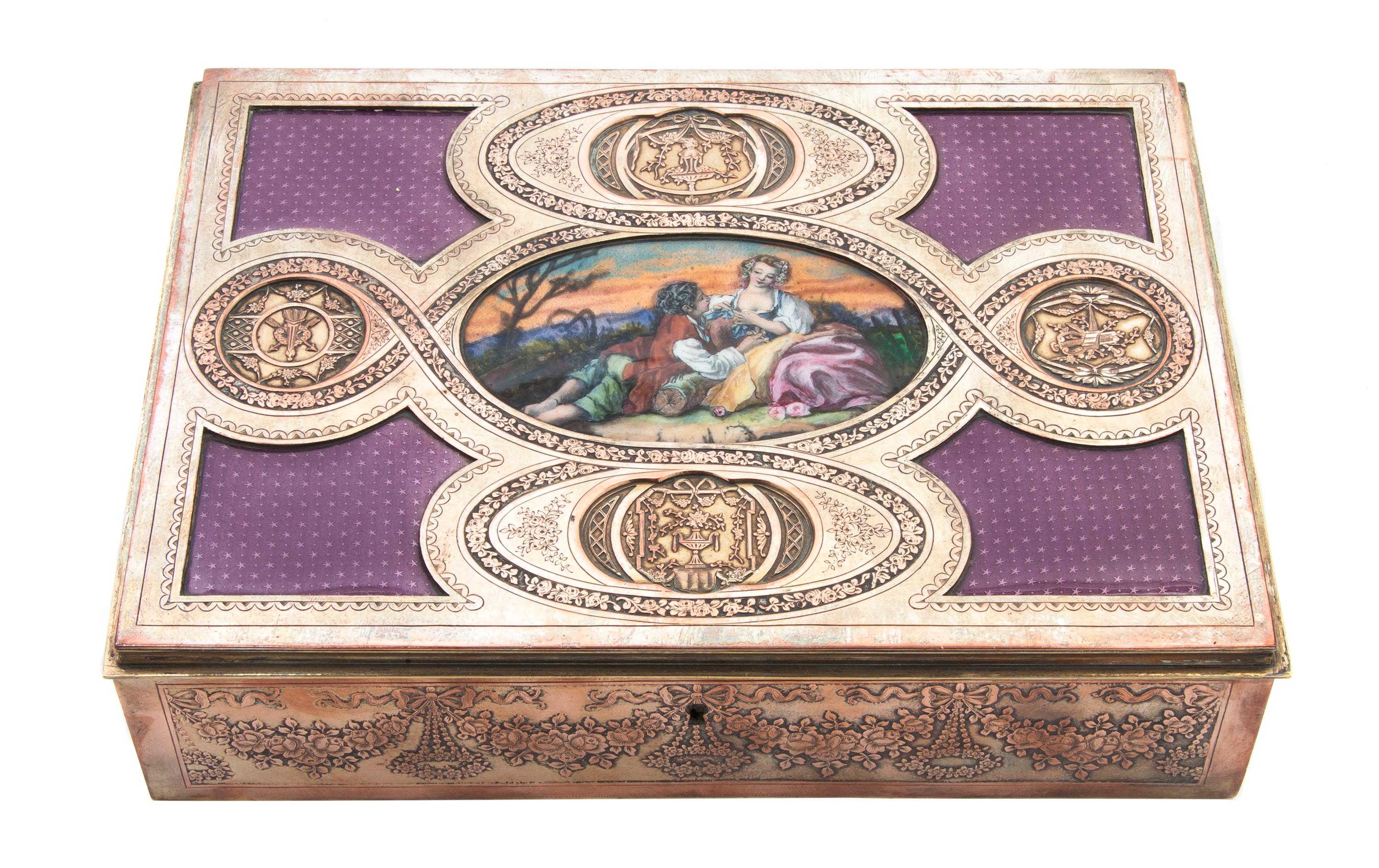 A French Silvered Bronze and Enameled Table Casket, Width 9 1/8 inches.