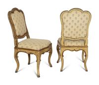 A Set of Four Venetian Rococo Cream-Painted and Parcel Gilt Dining Chairs