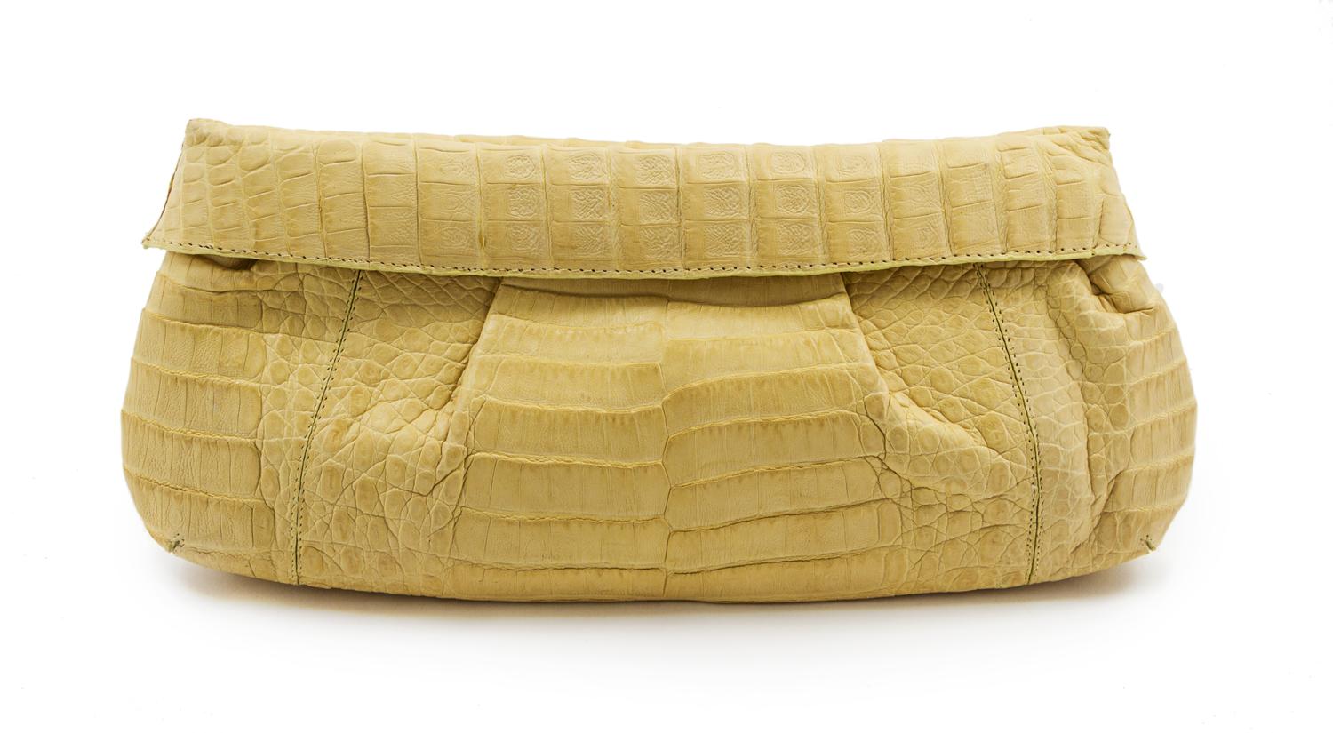 A Nancy Gonzalez Chartreuse Crocodile Clutch, 12 x 5 x 1 1/2 inches.