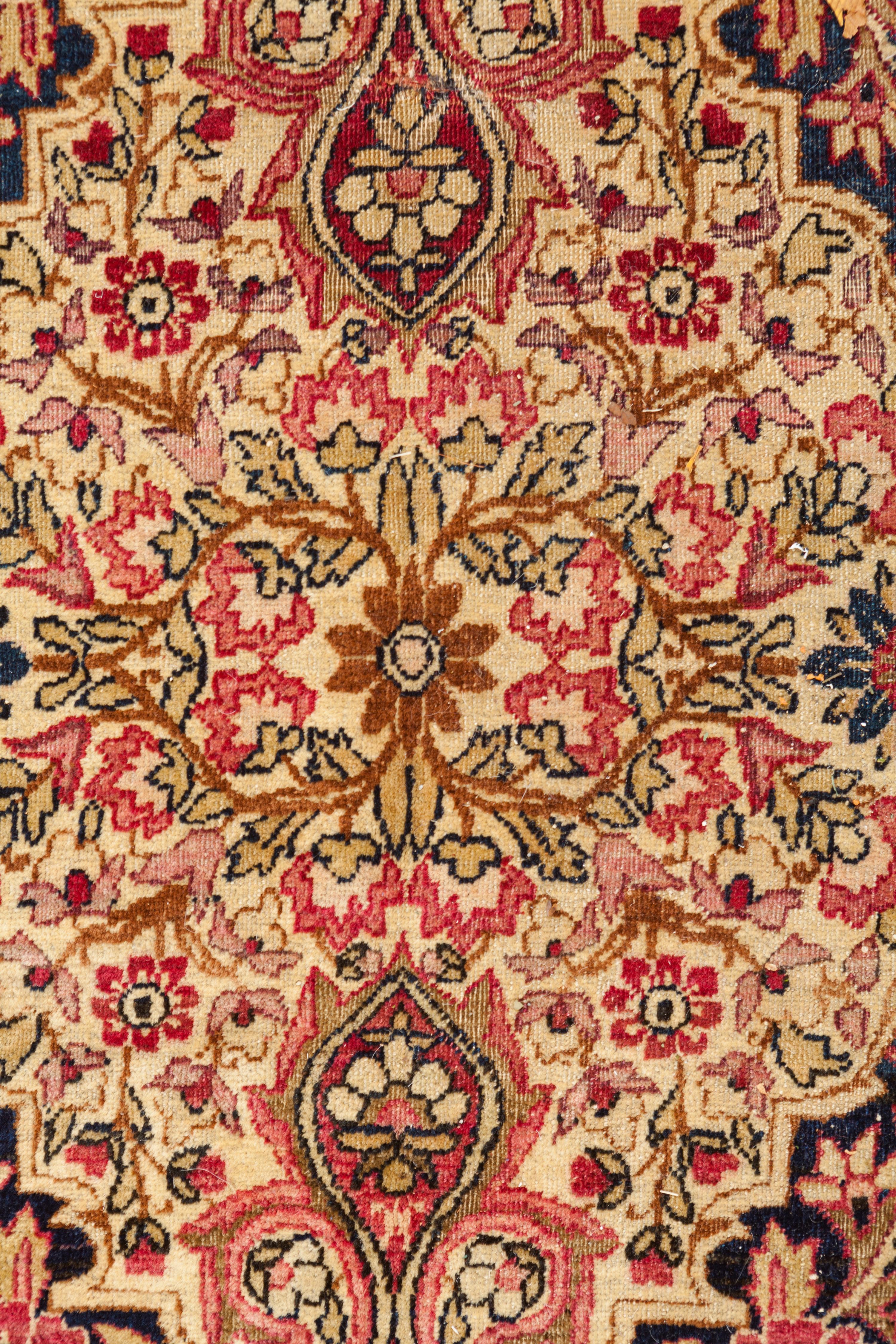 A Kirman Wool Rug