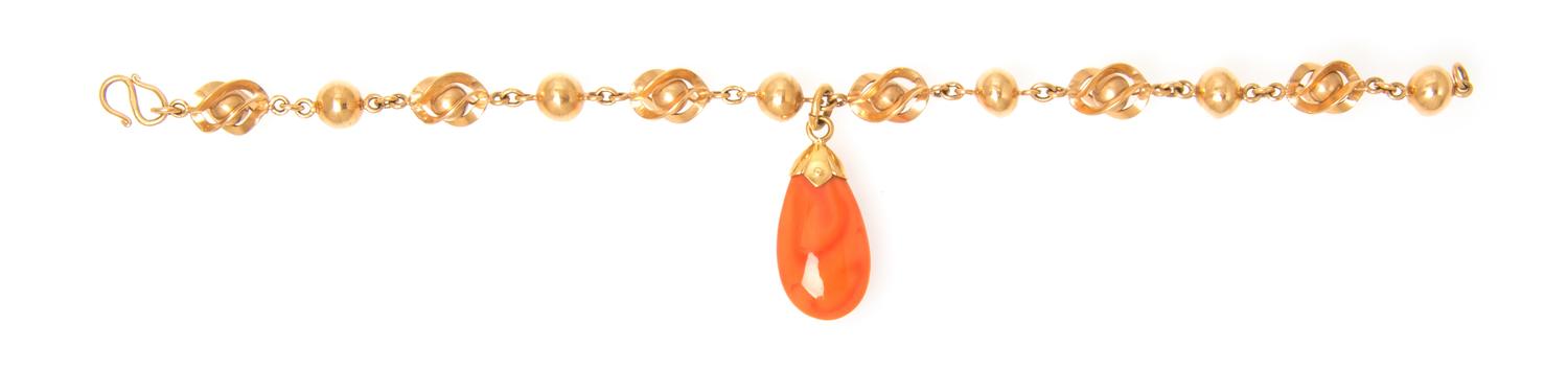 A Yellow Gold and Coral Bracelet, 6.90 dwts.