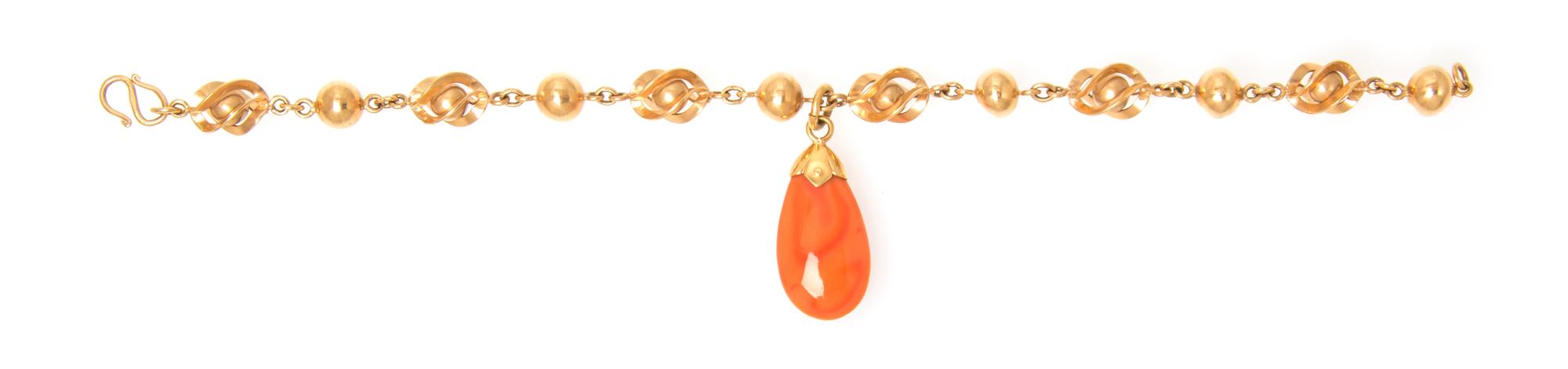 A Yellow Gold and Coral Bracelet, 6.90 dwts.