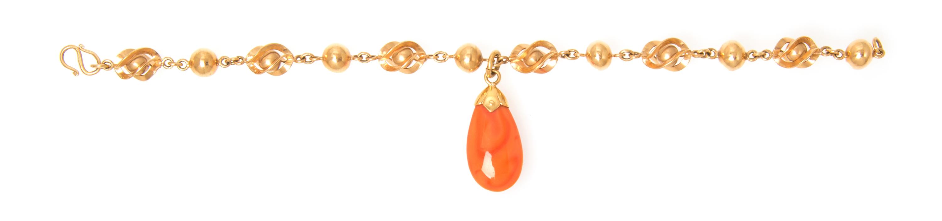 A Yellow Gold and Coral Bracelet, 6.90 dwts.