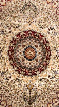 A Qom Wool and Silk Rug