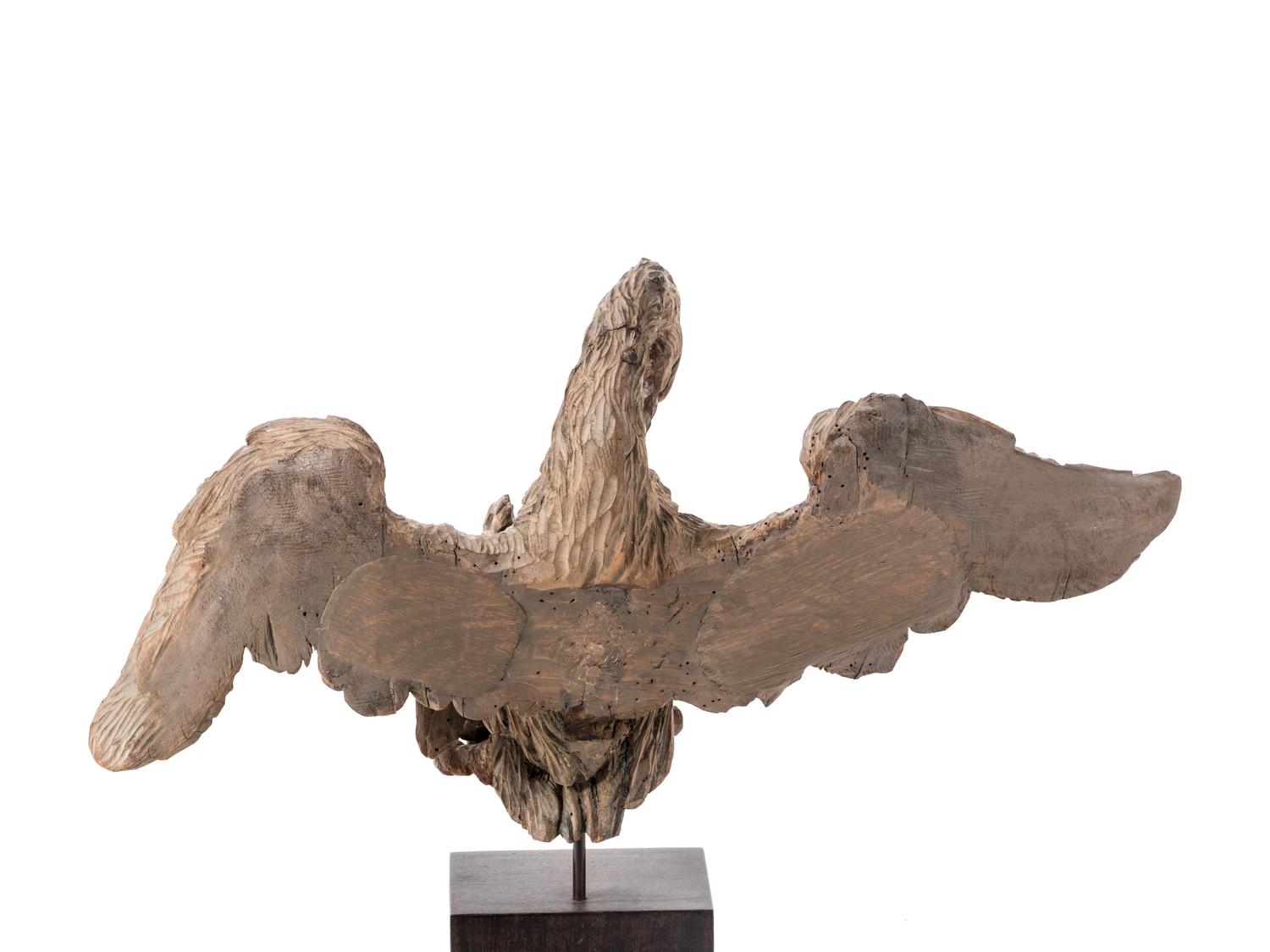 A Carved Wood Model of a Spread-Winged Eagle on an Associated Pedestal