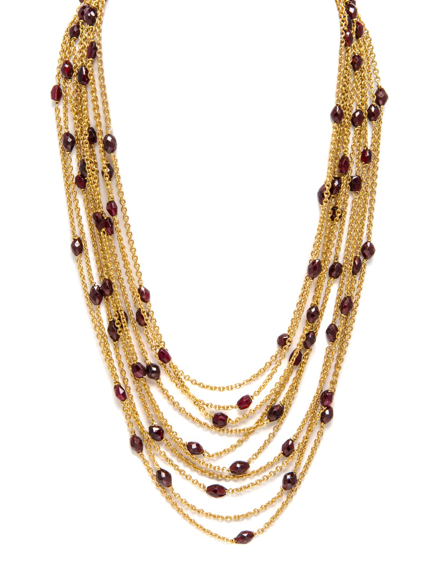 An 18 Karat Yellow Gold and Garnet Multi Strand Necklace, Scusi Paris, 53.70 dwts.
