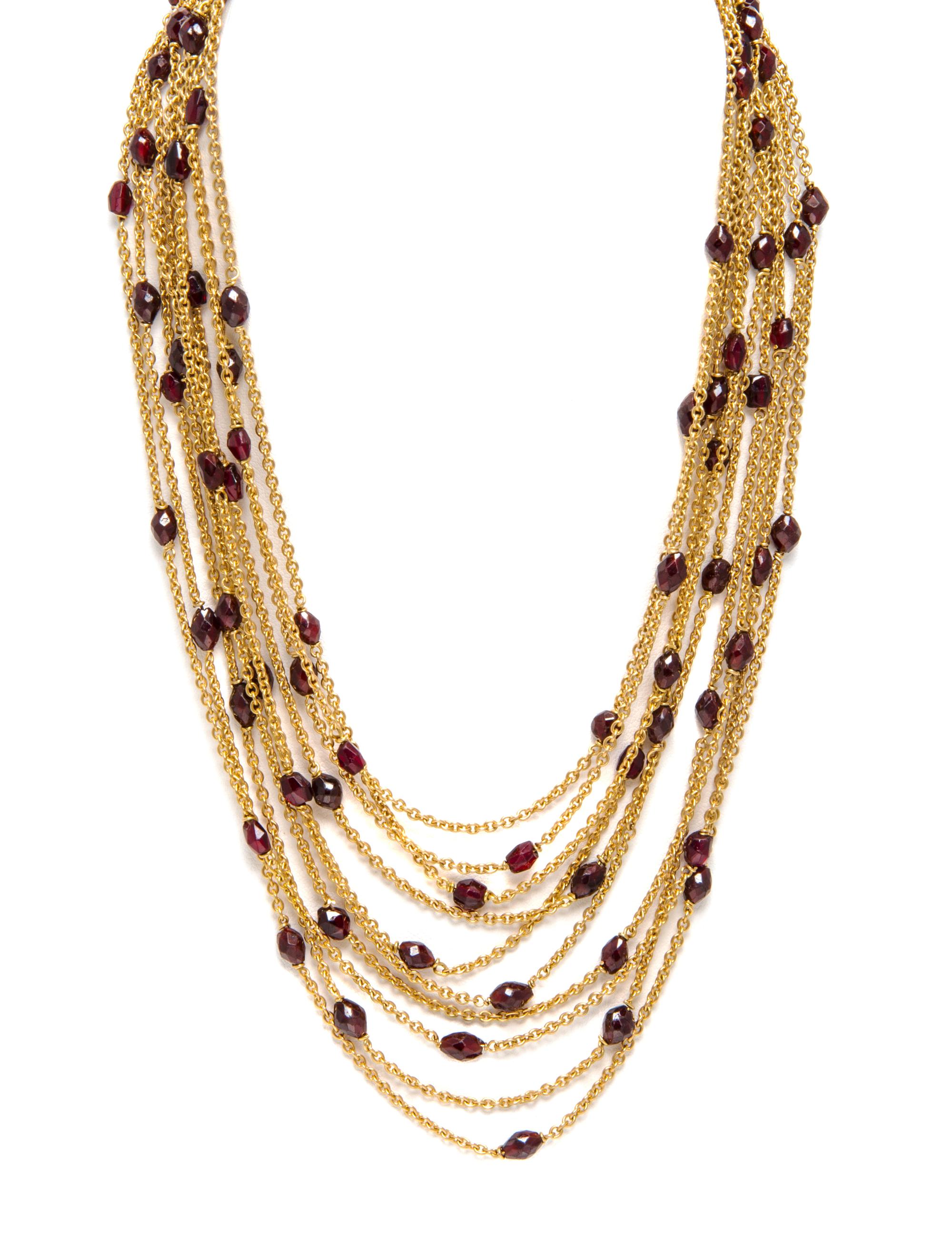 An 18 Karat Yellow Gold and Garnet Multi Strand Necklace, Scusi Paris, 53.70 dwts.