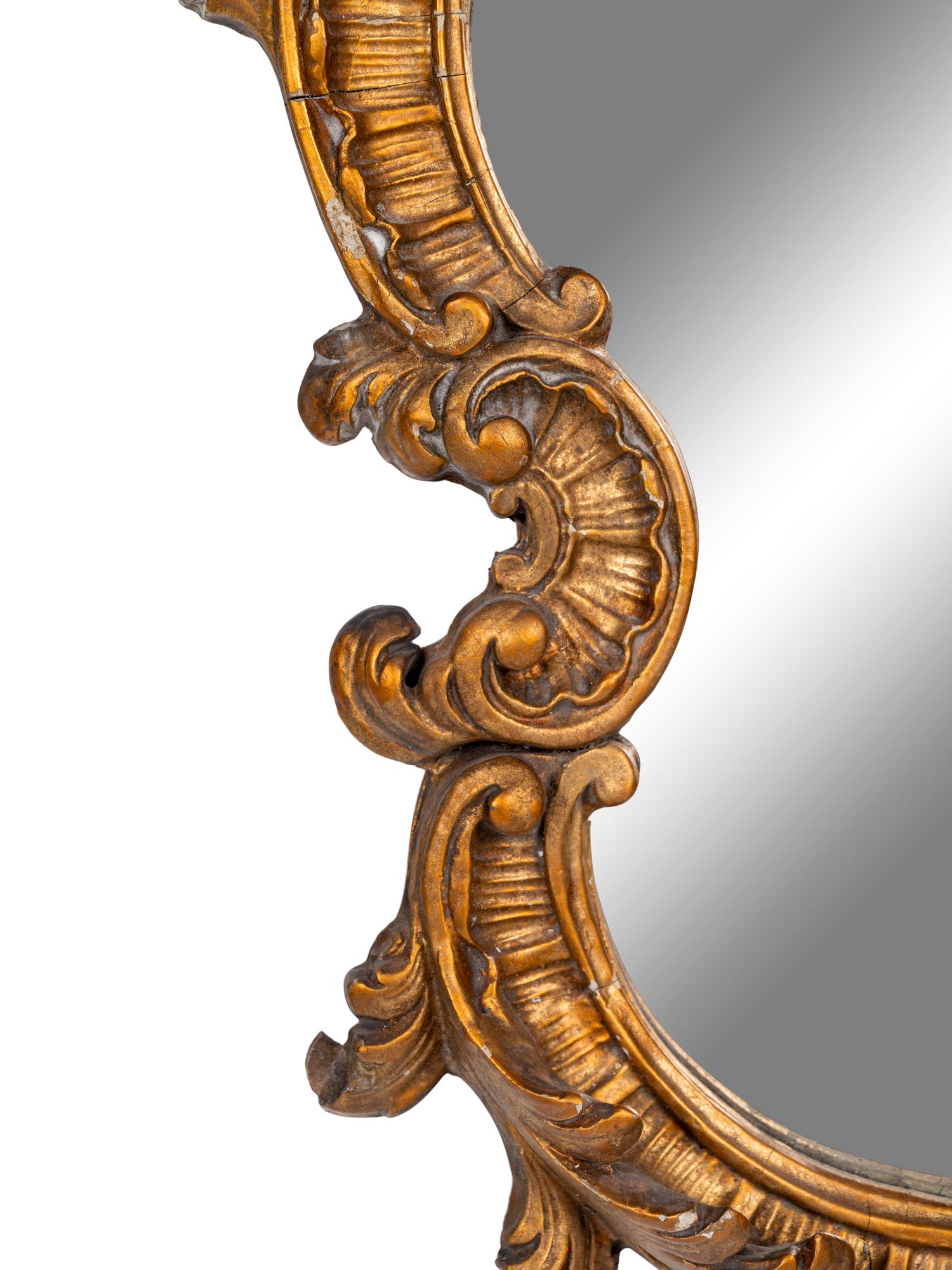 A Pair of Italian Rococo Style Giltwood Mirrors