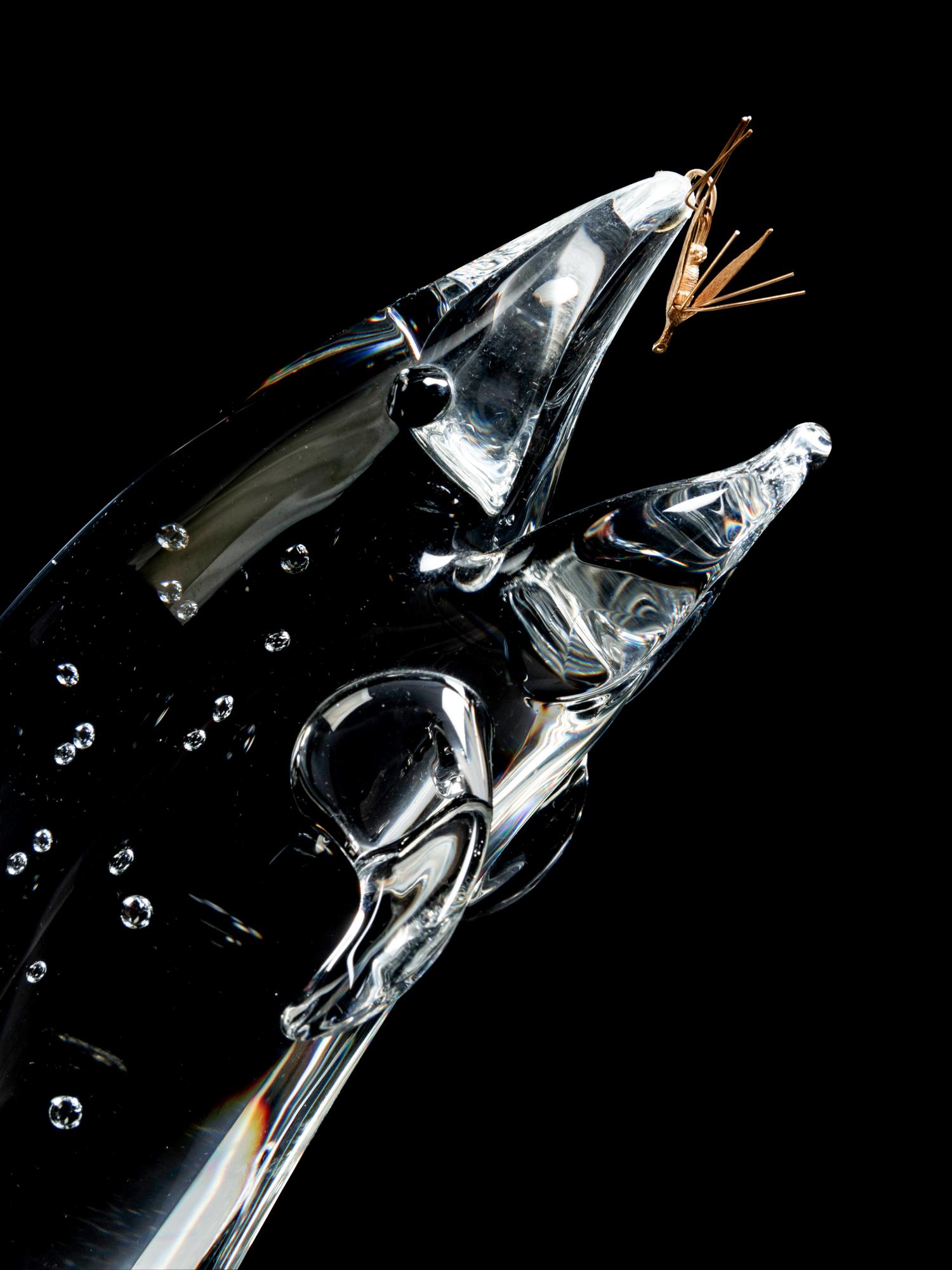 A Steuben Glass and 18K Gold Trout and Fly Figure