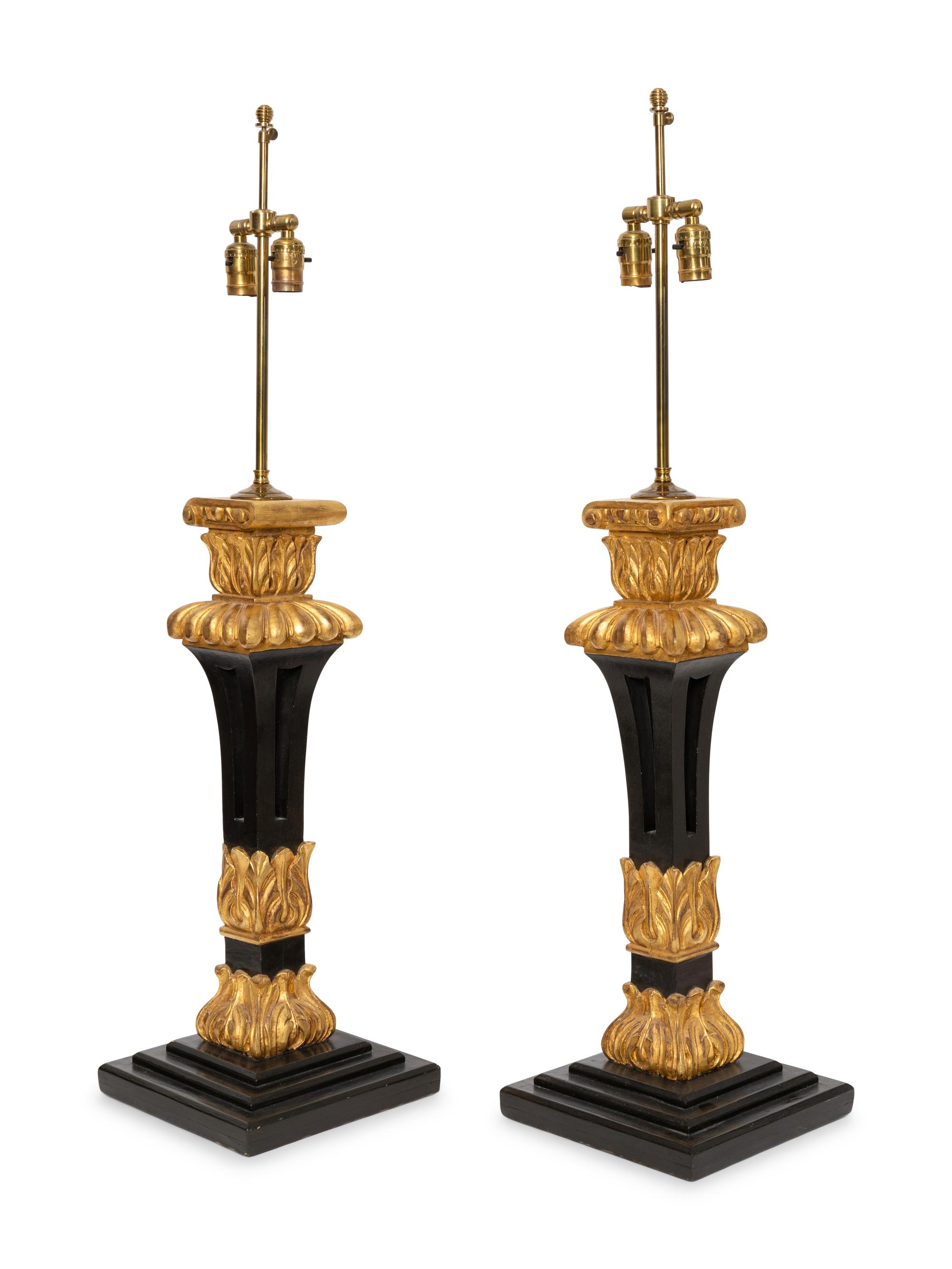 A Pair of Victorian Black-Painted and Parcel Gilt Table Lamps