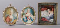 A Pair of Continental Portrait Miniatures, Height of pair with frames 3 3/4 inches.