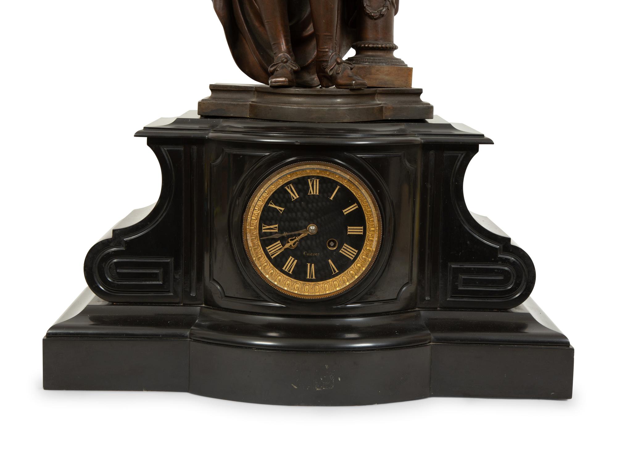 A French Black Marble and Cast Metal Figural Mantel Clock