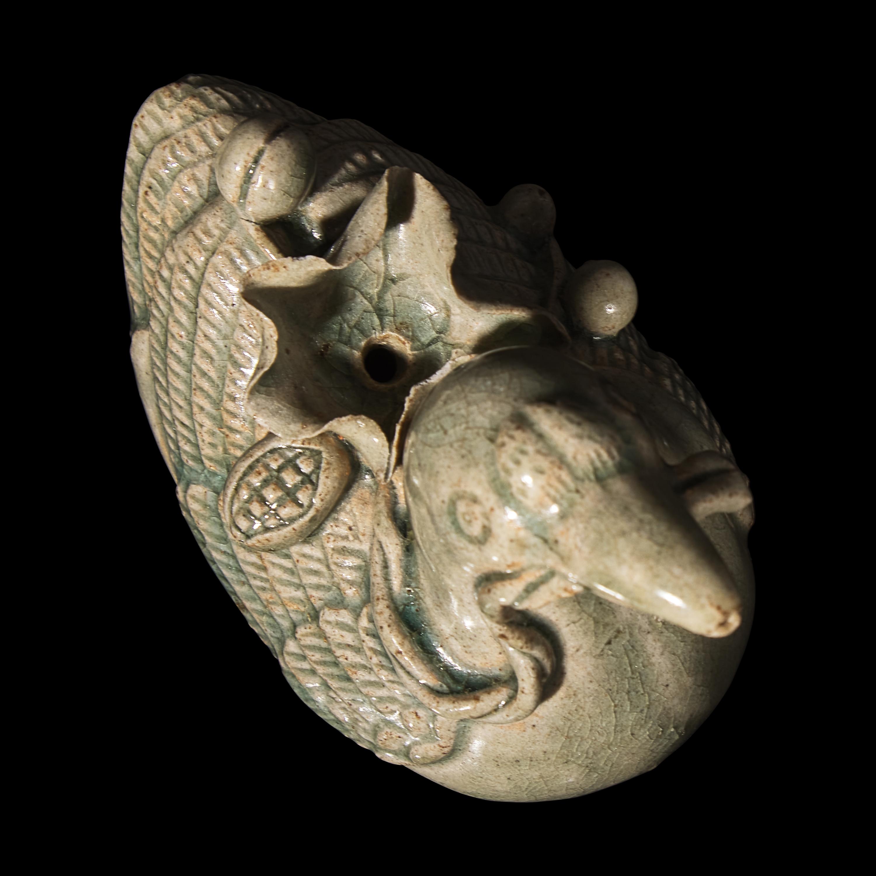 A Korean Celadon Glazed Porcelain Duck-Form Water Dropper 青釉鴨形硯滴