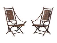 A Pair of English Aesthetic Movement Walnut Folding Chairs
