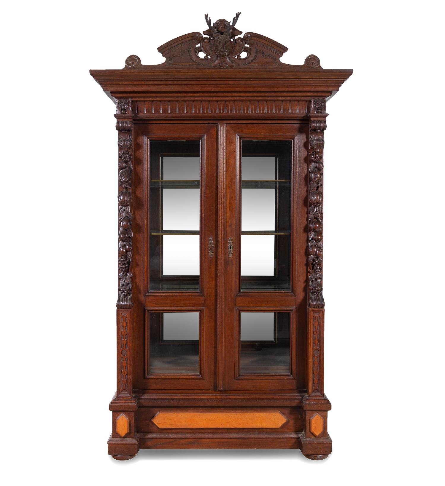 A Black Forest Style Carved Oak Cabinet