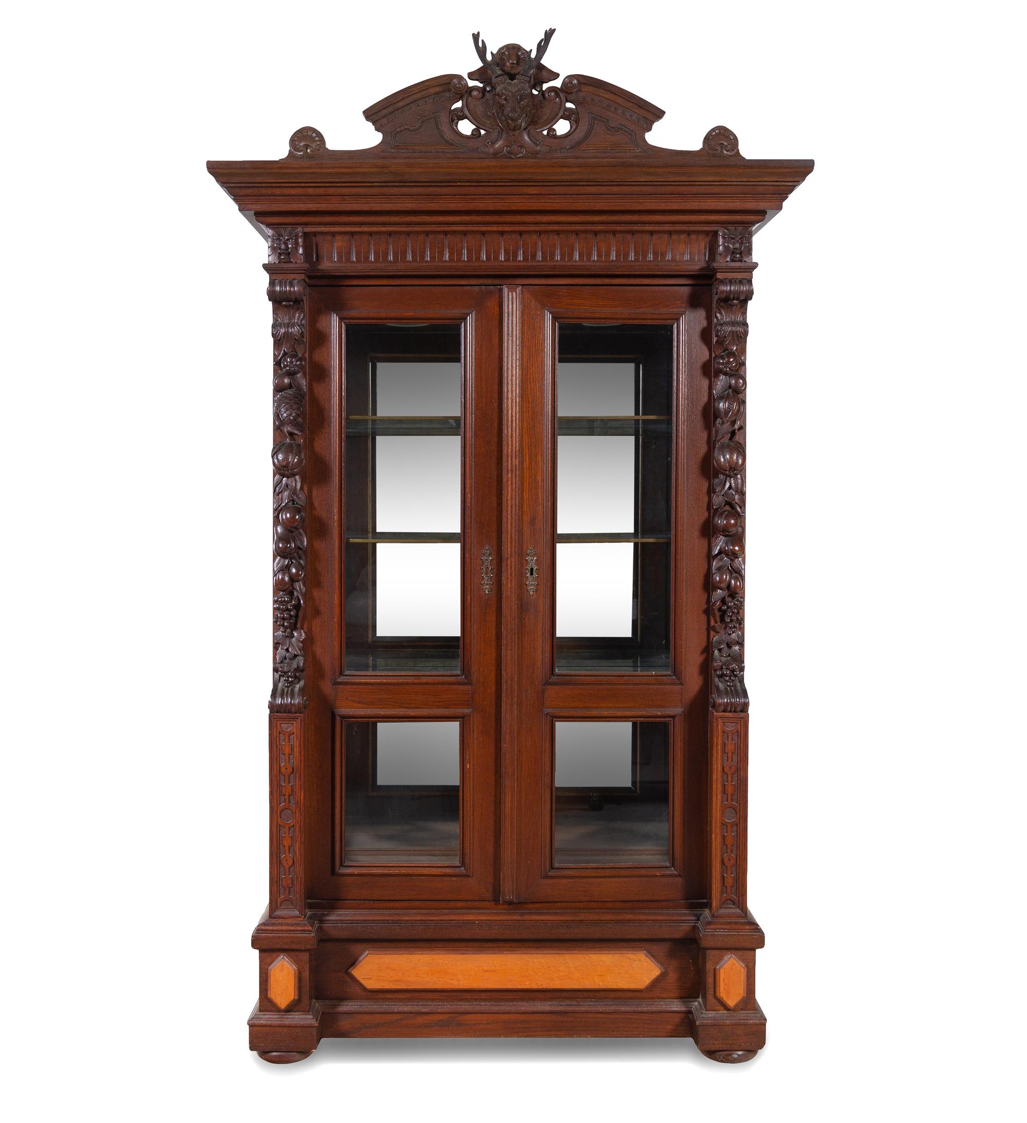 A Black Forest Style Carved Oak Cabinet