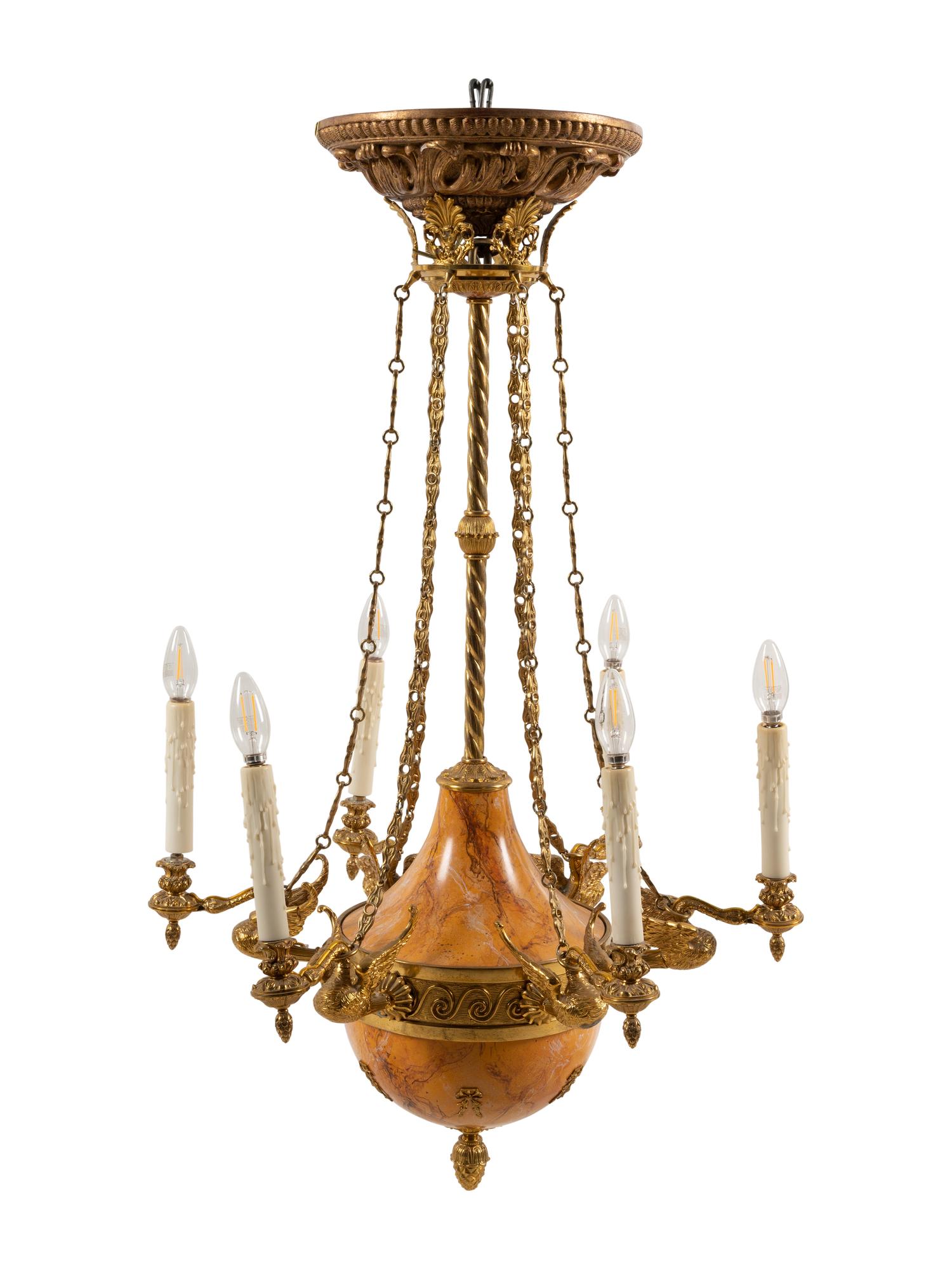 An Empire Style Gilt Metal and Simulated Marble Six-Light Chandelier