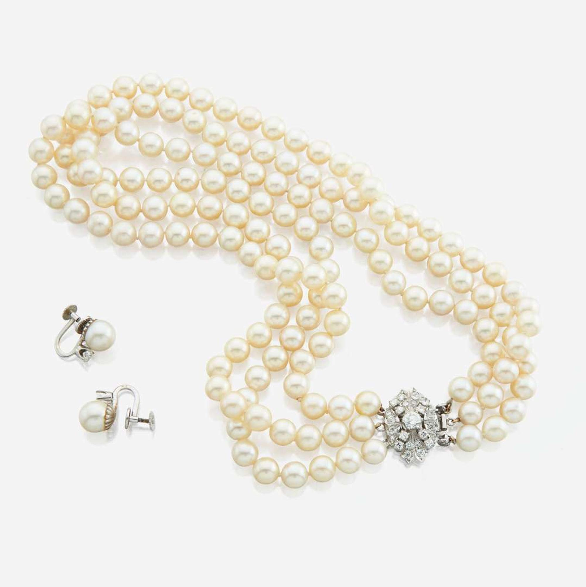 A cultured pearl, diamond, and platinum necklace with similar ear clips