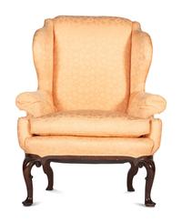 A Queen Anne Style Scroll-Carved Mahogany Easy Chair