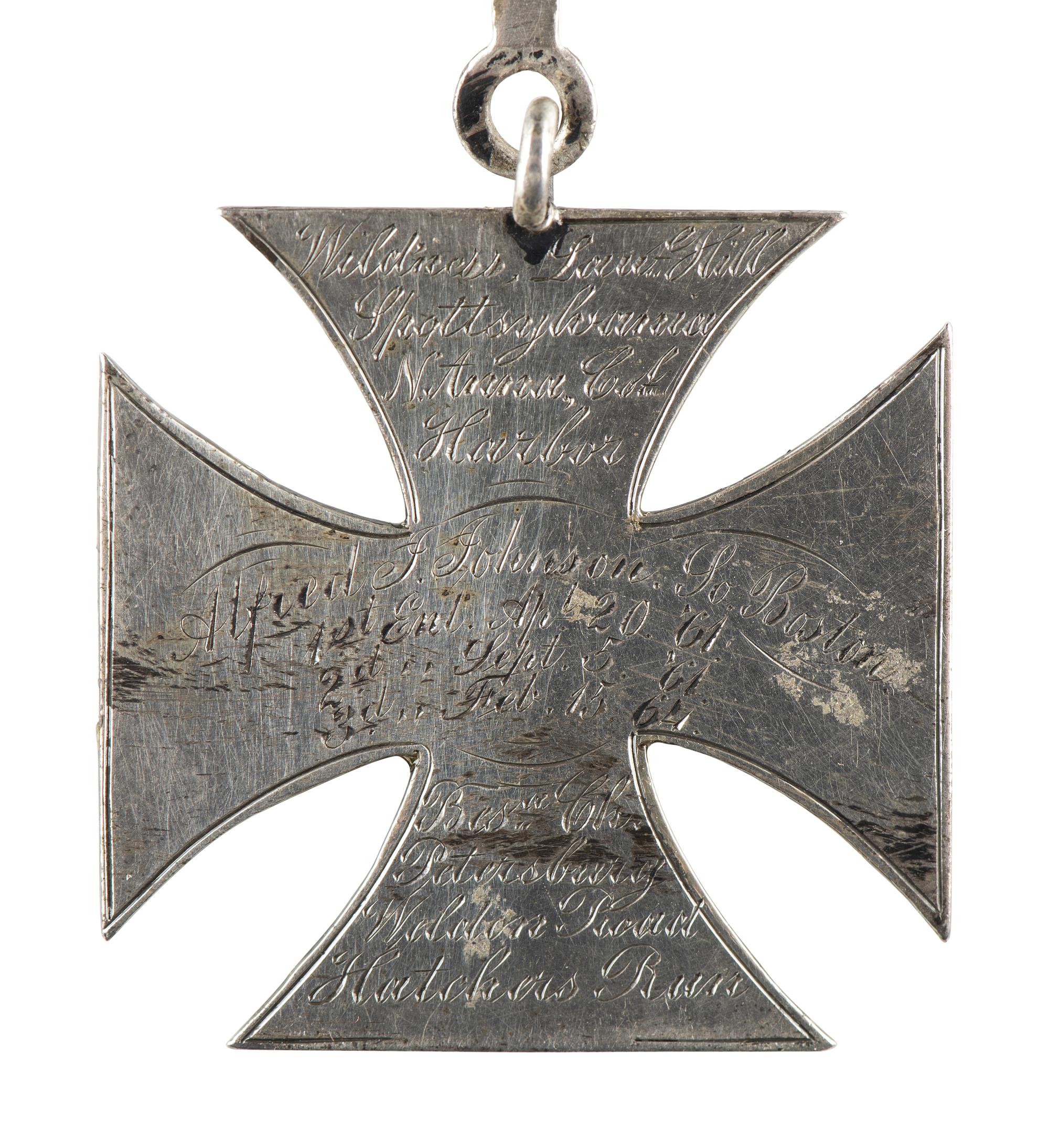 [CIVIL WAR]. Badge identified to Alfred J. Johnson, 1st, 3rd, and 5th Massachusetts Light Artilleries.
