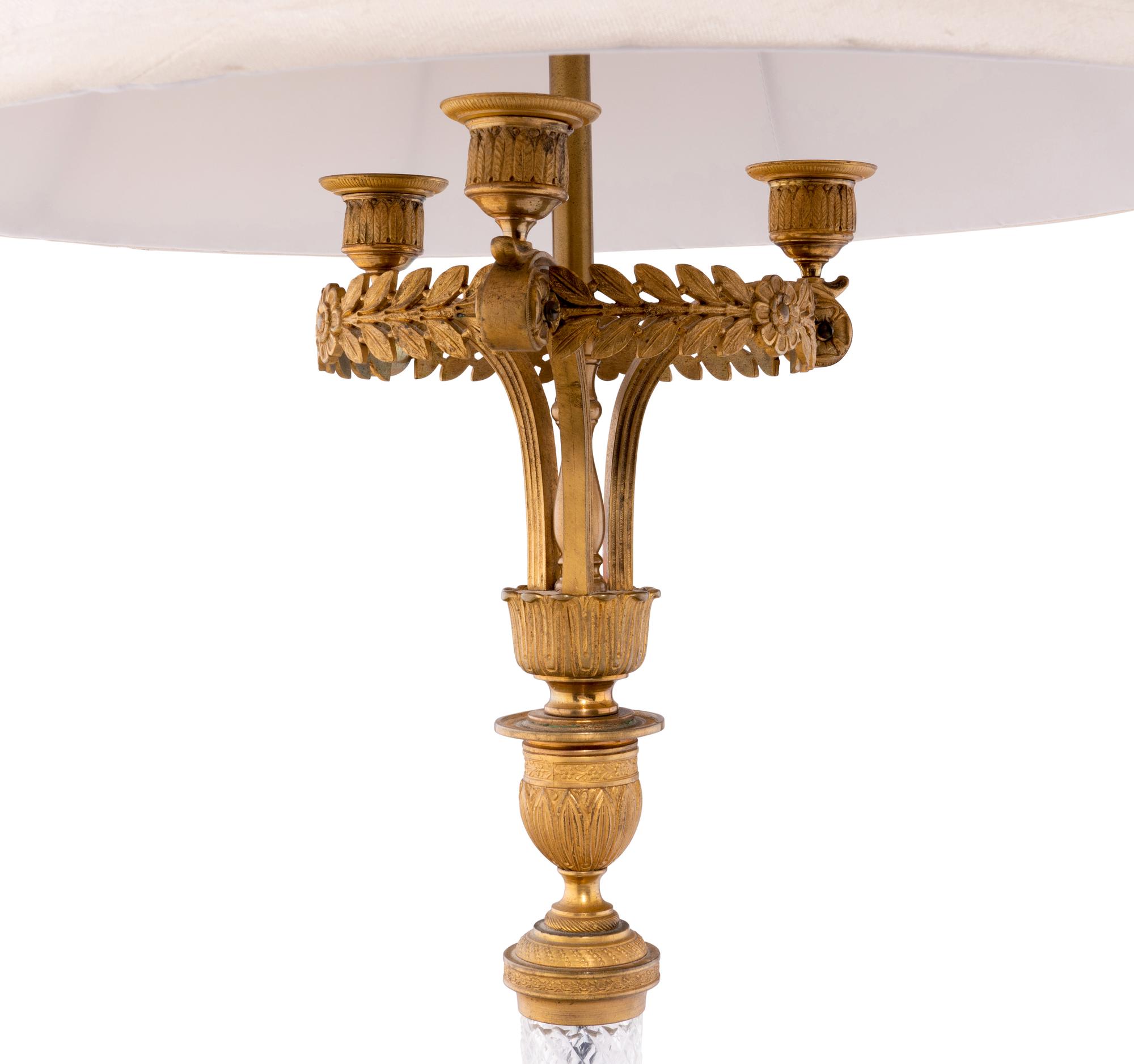 A Pair of Empire Style Gilt Bronze and Cut Glass Lamps