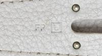 An Hermes White Taurillon Clemence Lindy 34 Handbag, 13.5" x 8" x 7".