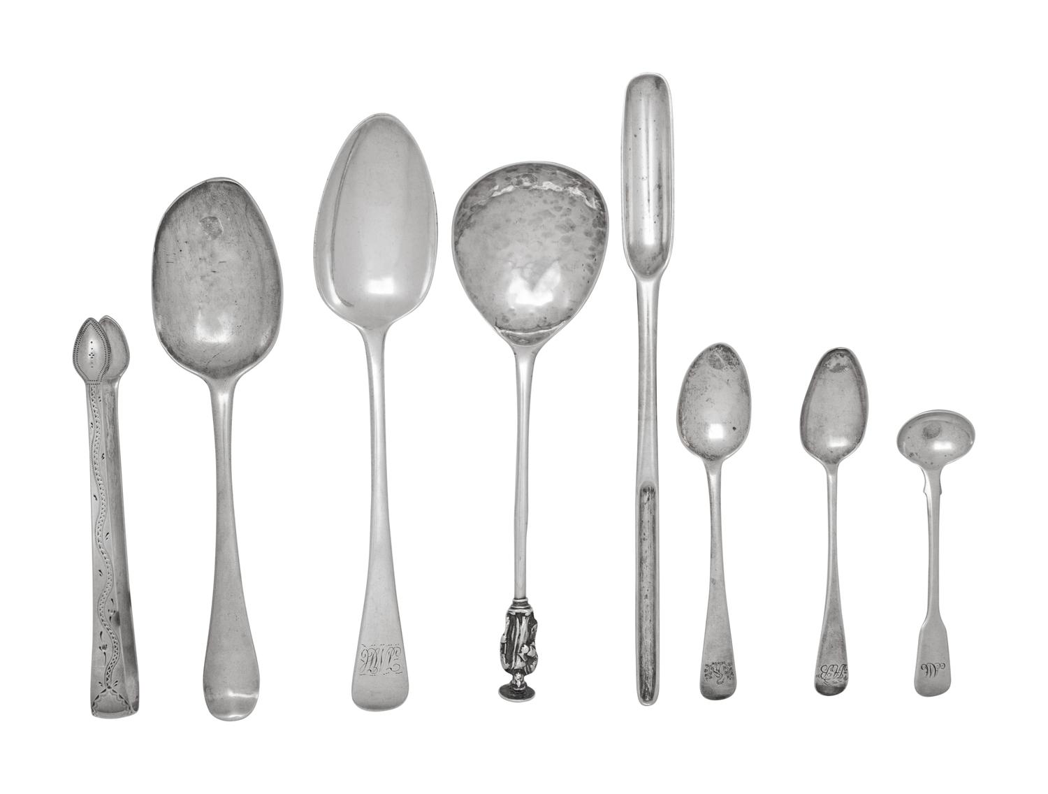 A Group of Eight English Silver Flatware Articles