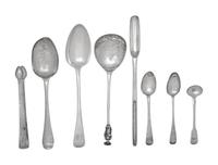 A Group of Eight English Silver Flatware Articles