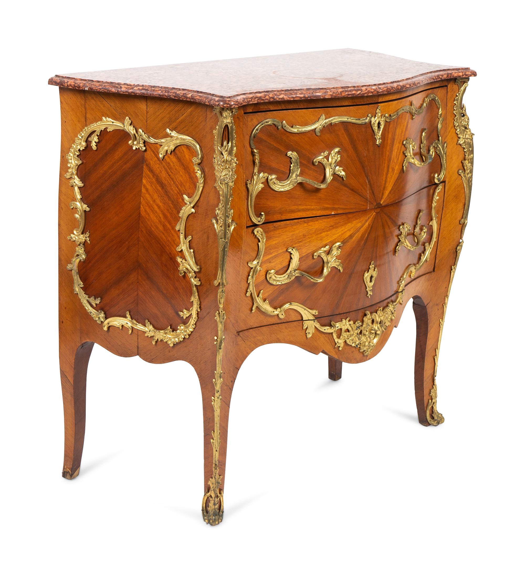 A Louis XV Style Bombe Commode with Sunburst Veneer and Gilt Metal Mounts — EARLY 20TH CENTURY