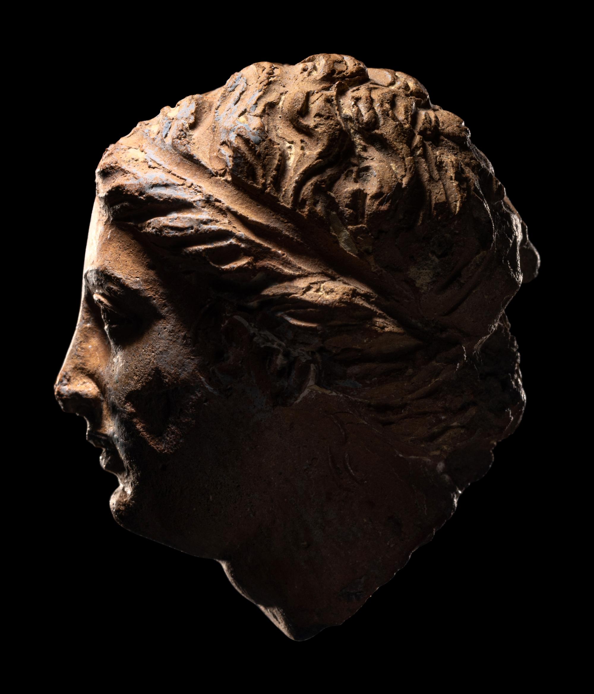 A Greek Terracotta Female Head