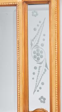 A Pair of Louis XVI Style Gilded Mirrors