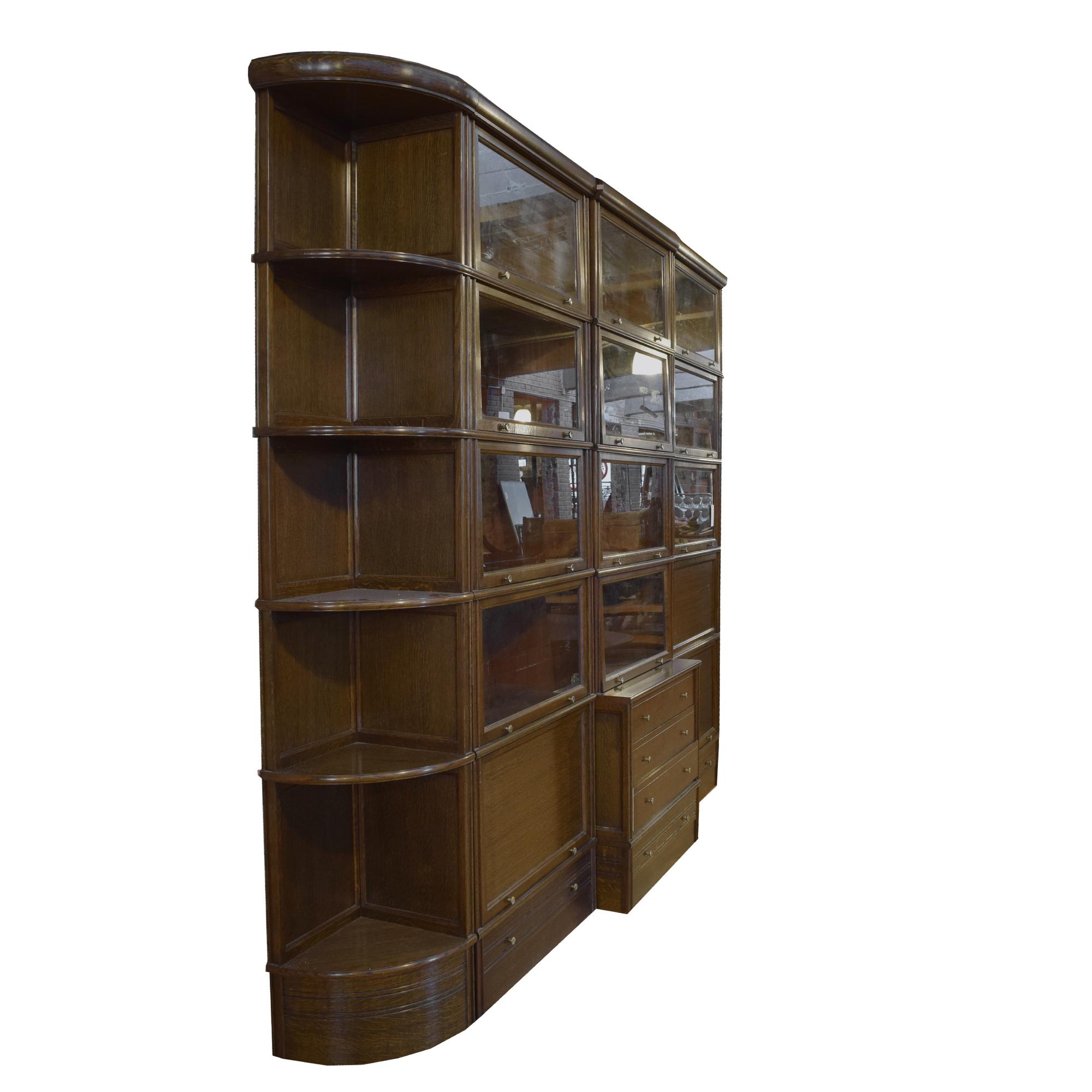 An Oak Multi-Door Filing Cabinet with Desk 109.5" W x 19" D x 91" H — France, Mid-20th Century